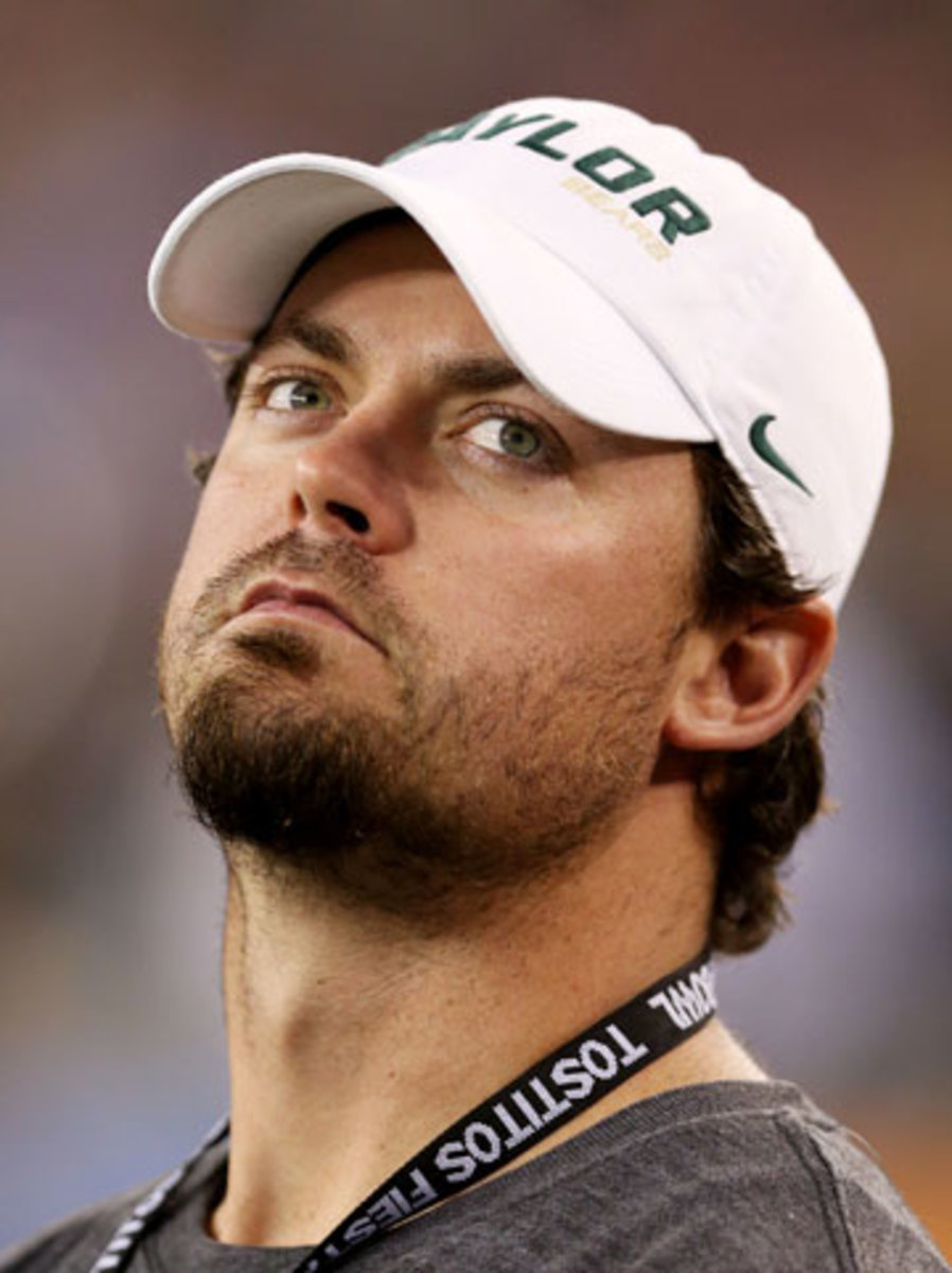Kolb on the sideline at the 2014 Fiesta Bowl. (Christian Petersen/Getty Images) 
